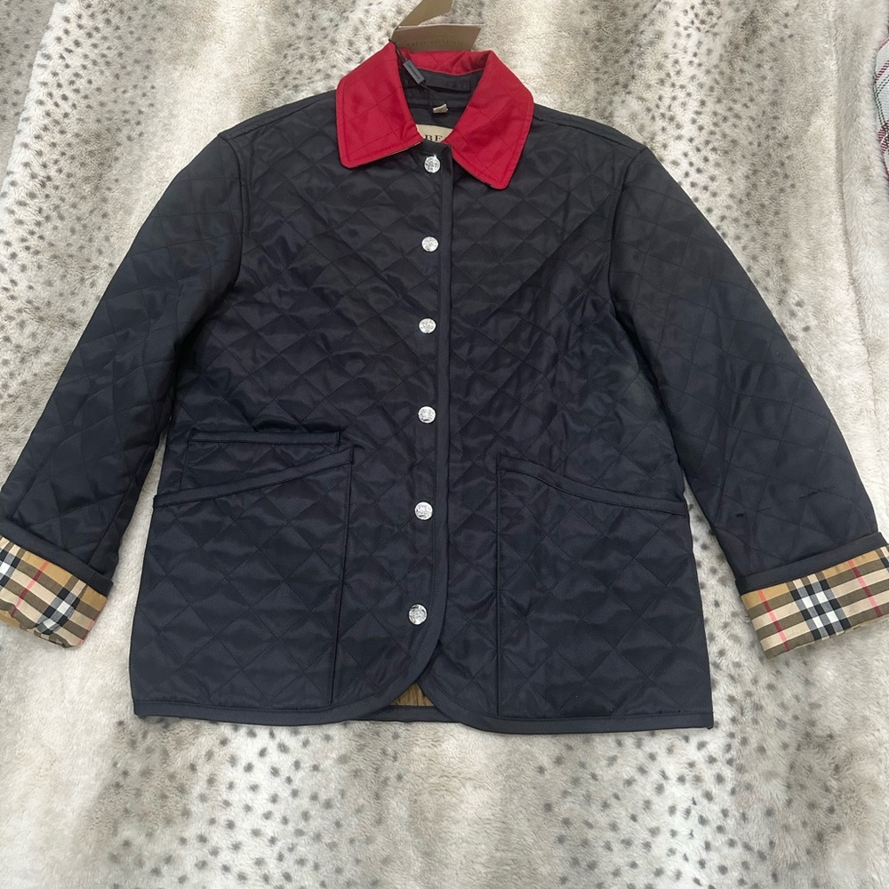 Women’s XS Burberry Navy Blue Quilted Jacket. It is NWT.